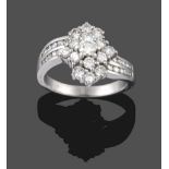 A Diamond Cluster Ring, the central cluster of round brilliant cut diamonds in white claw