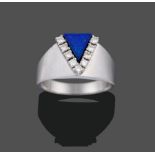 A Contemporary Lapis Lazuli and Diamond Ring, a triangular panel of lapis lazuli with round