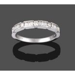 An 18 Carat White Gold Diamond Half Hoop Ring, five round brilliant cut diamonds alternate with