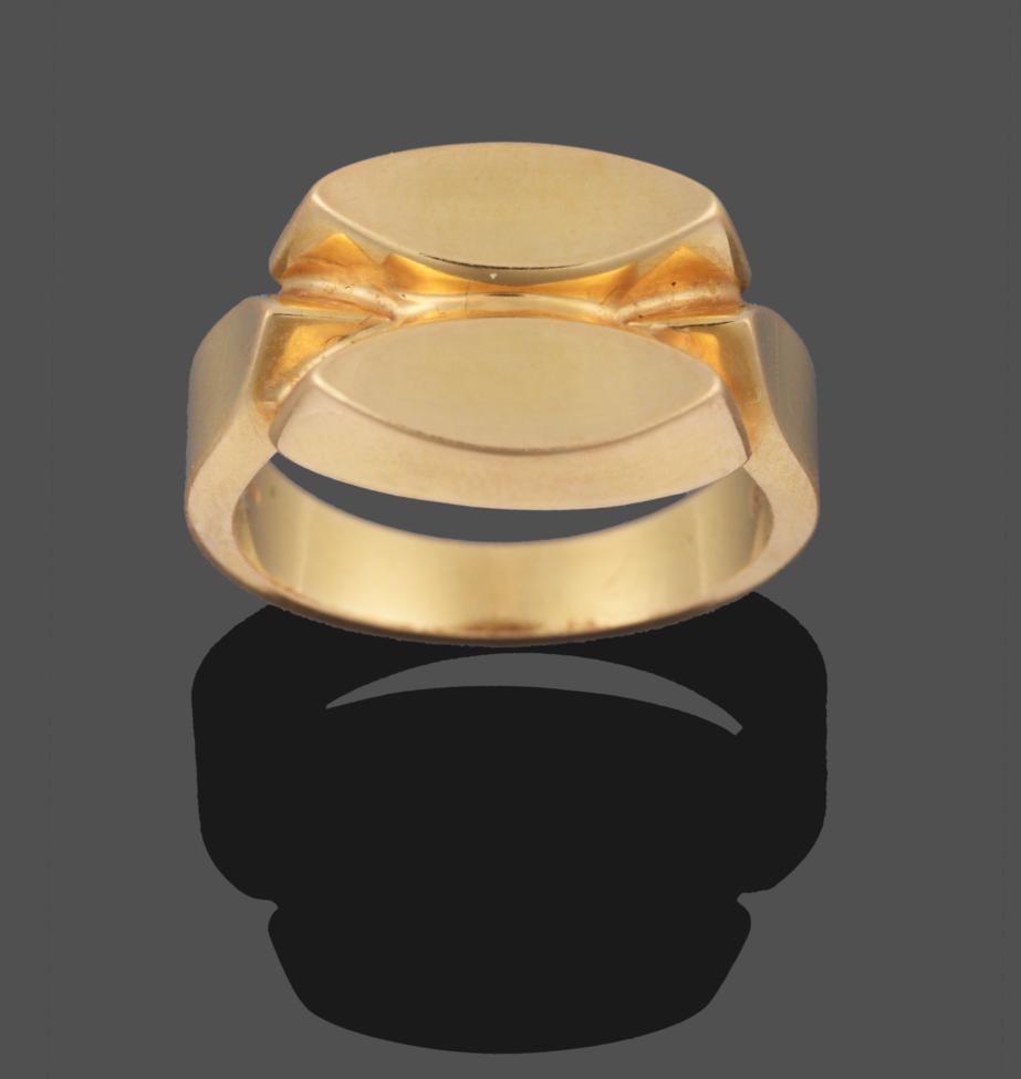 An 18 Carat Gold Ring, by Georg Jensen, of two concave lozenge forms on a pointed shoulder plain