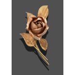 An 18 Carat Gold Floral Brooch, realistically modelled as a rose bud, measures 6cm by 3cm see