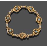 A Turquoise and Seed Pearl Bracelet, a fancy link yellow chain set throughout with seven alternating