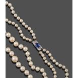 A Two Row Cultured Pearl Necklace, the graduated 65:72 pearls knotted to an oblong clasp