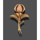 An 18 Carat Gold Floral Brooch, realistically modelled as a rose bud, measures 5.7cm by 3.5cm see