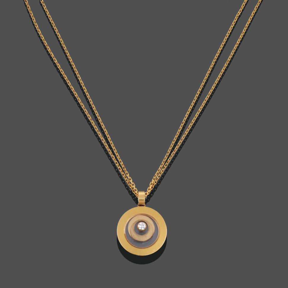 An 18 Carat Gold ''Happy Spirit'' Pendant on Chain, by Chopard, a collet set 'floating' round