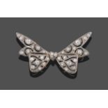 A Diamond Bow Brooch, the bow with pierced decoration and set throughout with old cut diamonds,