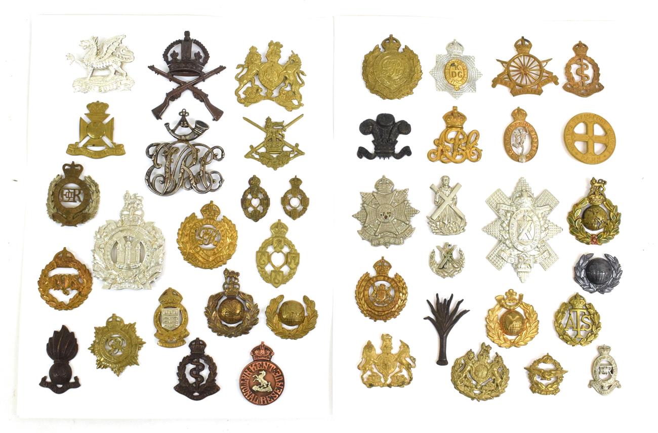 A Collection of Forty Two British Cap and Collar Badges, including a white metal cloth helmet