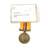 An Iraq Medal, 2004, awarded to W1033632 CPL P F WARNER R SIGNALS, in box of issue