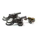 A Pair of Cast Iron Models of Cannons, each with 24cm tapering barrel with four graduated rings, the