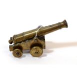 A 19th Century Bronze Signal Cannon, the 23cm double ringed barrel with flared muzzle, rounded