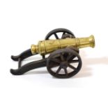 A 19th Century Signal Cannon, the 22cm ringed brass barrel with flared muzzle, a large seal before
