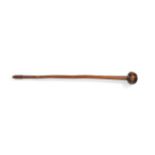 An Early 20th Century Zulu Knobkerrie, of hard wood with deep chestnut coloured patina, the