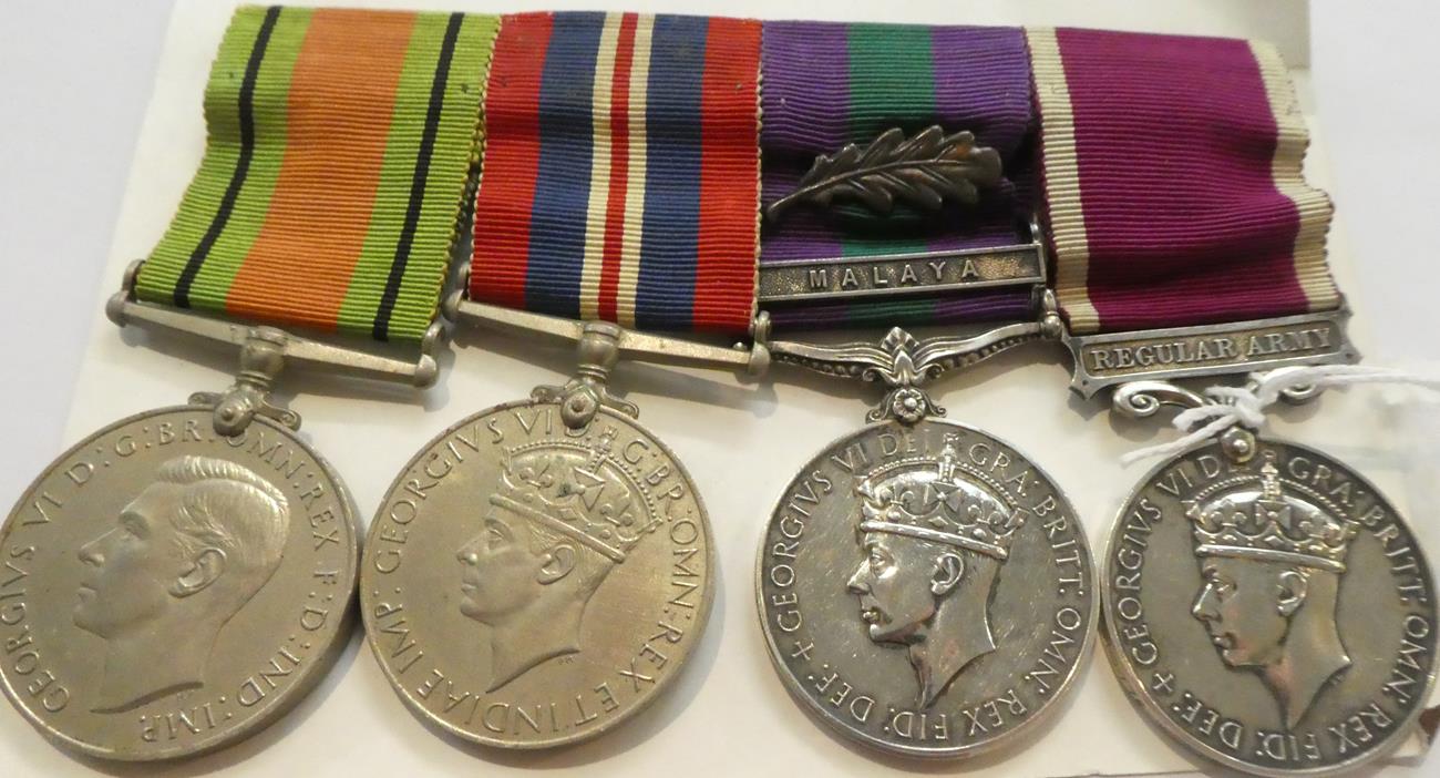 A Second World War Long Service Group of Four Medals, comprising Defence Medal, War Medal, General - Image 2 of 7