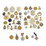 A Collection of Thirty Nine Second World War and Later British Cap and Collar Badges, including an