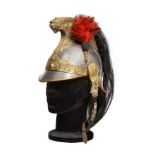 A French Model 1874 Cuirassier Helmet, with steel skull, the brass comb embossed with beaded fluting