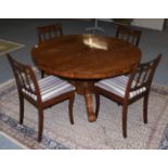 An early Victorian rosewood circular dining table