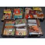 A large quantity of children's annuals including the Beano; the Dandy; Giles etc (seven boxes)