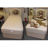 A pair of Slumberland memory foam 3ft beds with floral padded headboards