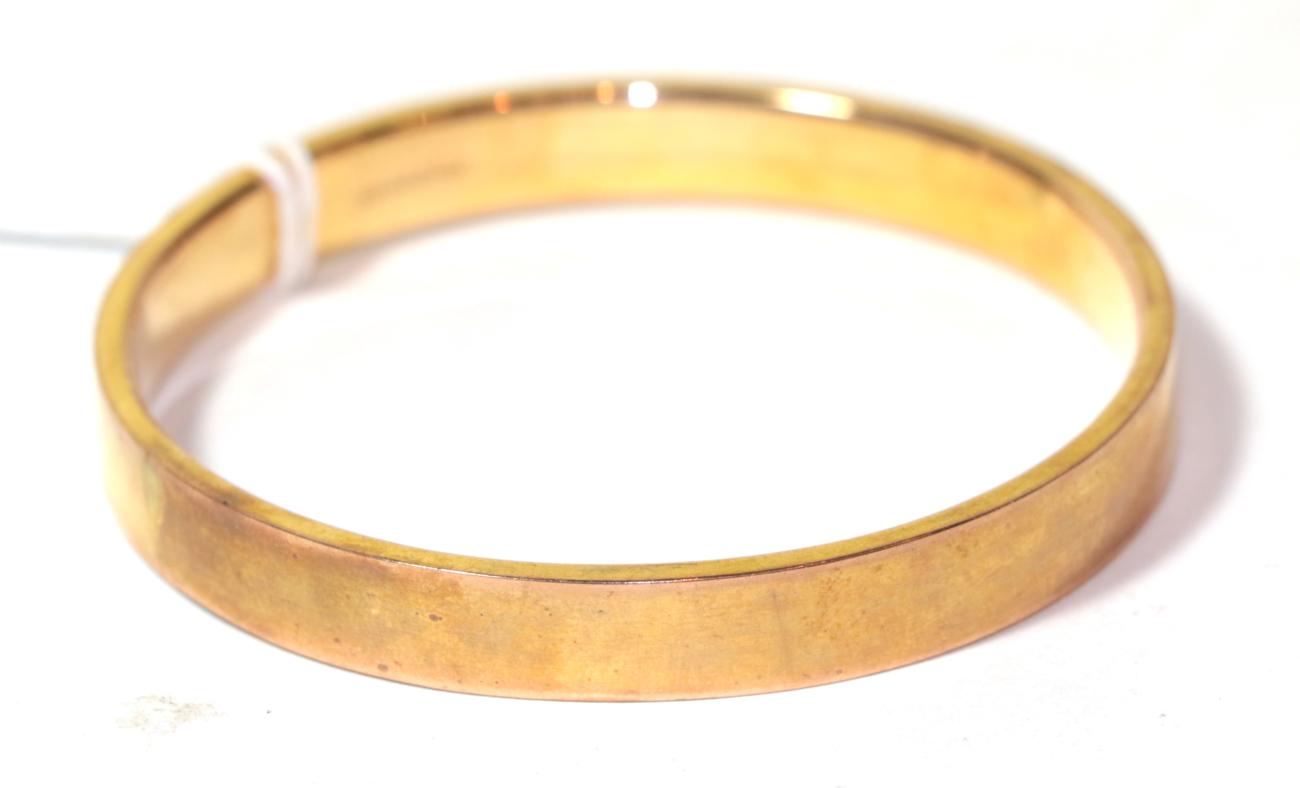 A 9 carat gold bangle, internal diameter 7.1cm . Gross weight 12.1 grams