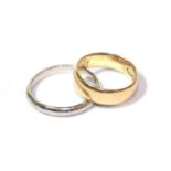 A band ring, stamped 'PLATINUM', finger size I1/2; and a yellow band ring, finger size D (2). Ring