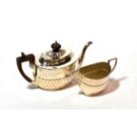 A Victorian silver teapot and a similar sugar-bowl, the teapot maker's mark HH, possibly for