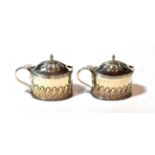 A pair of Victorian silver mustard-pots, by Samuel Walton Smith, Birmingham, 1894, each oval