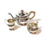 A three-piece George V silver tea-service, by the Goldsmiths and Silversmiths Co. Ltd., London, 1932