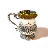 A George IV silver mug, maker's mark ?E, London, 1829, baluster, the lower body chased with