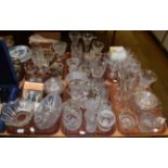 A pair of early 20th century cut glass wall lights, and an extensive collection of glassware