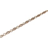 A 9 carat gold oval and circular link necklace, length 36cm. Gross weight 19.6 grams.