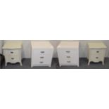 A pair of white three-drawer bedside cabinets; together with a pair of cream two-drawer bedside