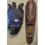African carved hardwood mask and similar with beadwork decoration