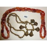Tribal Art - two necklaces of polished stone and bronze bells