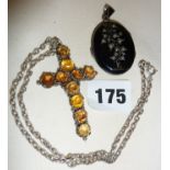 Enamelled mourning locket with hair insert, and a silver crucifix set with topaz on silver chain