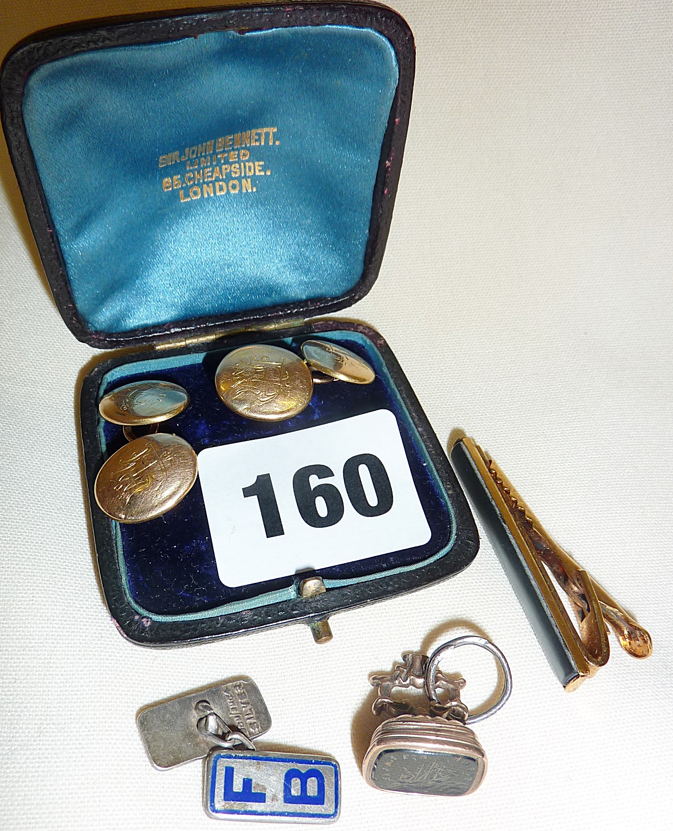 Gold? cufflinks and Intaglio fob seal depicting galleon, etc.