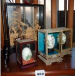 Fine Chinese pierced cork landscape in glass case, painted cased eggs, etc.