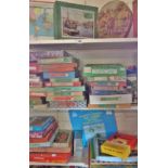 Large collection of Victory and other jigsaw puzzles (on 3 shelves)