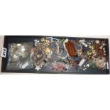 Box of costume jewellery, some silver. Charm bracelet, brooches, etc.