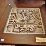 Wood framed ceramic relief plaque of a Phoenician sailing vessel commemorating the