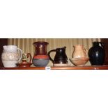 Assorted studio pottery, inc. jugs, bowl, vase and a small black glazed Doulton stoneware flagon (