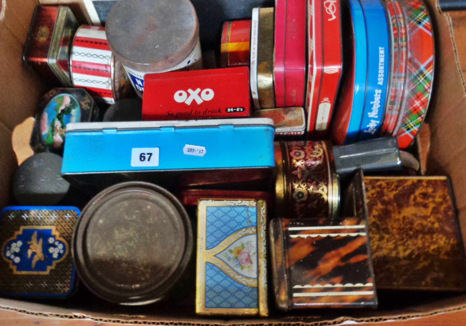 Box of assorted old tins