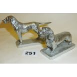 Two vintage chromed dog classic car mascots or hood ornaments, a dachshund and another