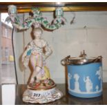 Continental porcelain figural two branch candlestick and a Wedgwood blue Jasperware biscuit barrel