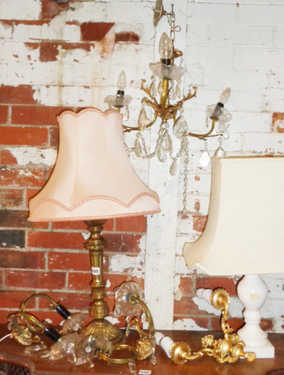 Two table lamps, two chandeliers, wall lights, etc.