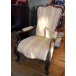 Mid 19th c. arched top open armchair with carved mahogany frame having scroll arms sweeping down