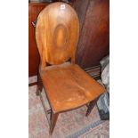 19th c. hall chair with oval solid back standing on square tapering legs