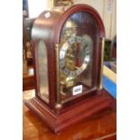 A Hermle 14 day mantel clock with skeleton movement