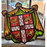 Antique stained and painted glass heraldic shield (A/F)