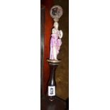 Regency fixed fan or face screen handle decorated with a porcelain lady figure and moulded