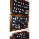 Large quantity of mounted reproduction cap badges